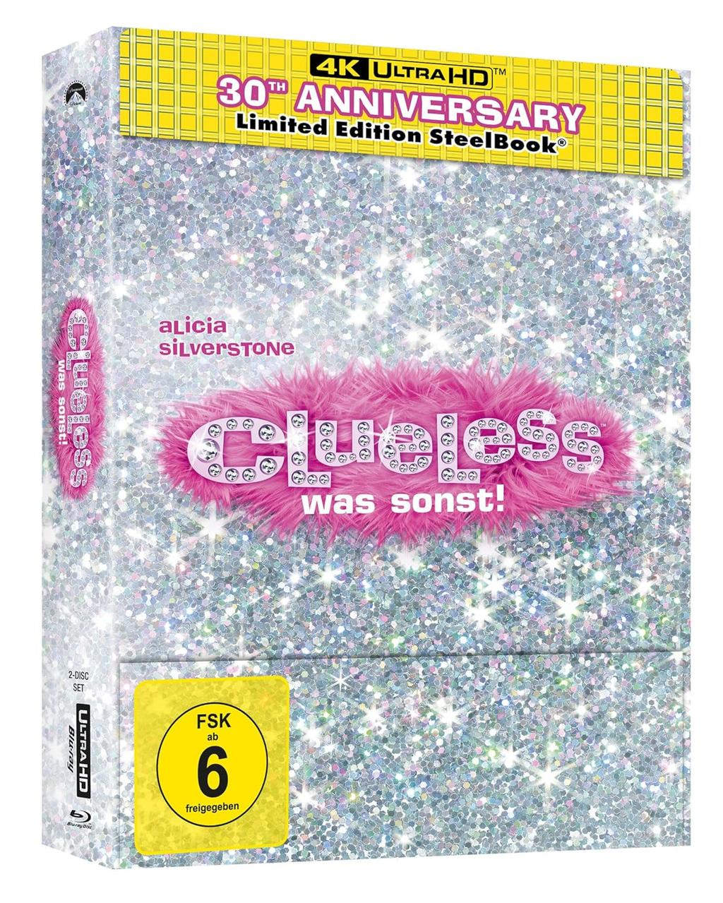 Filmcover mit dem Wort 'Clueless' auf einem rosa, flauschigen Hintergrund. Der Filmtitel ist weiß, mit der Bewertung.