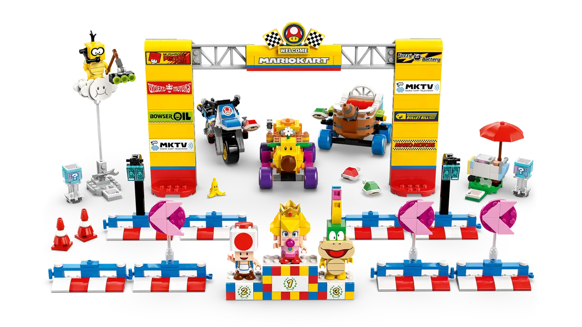 Zestaw Lego Mariokart. Linia mety, gokarty i postacie, w tym Mario, Peach i Koopa Troopa.