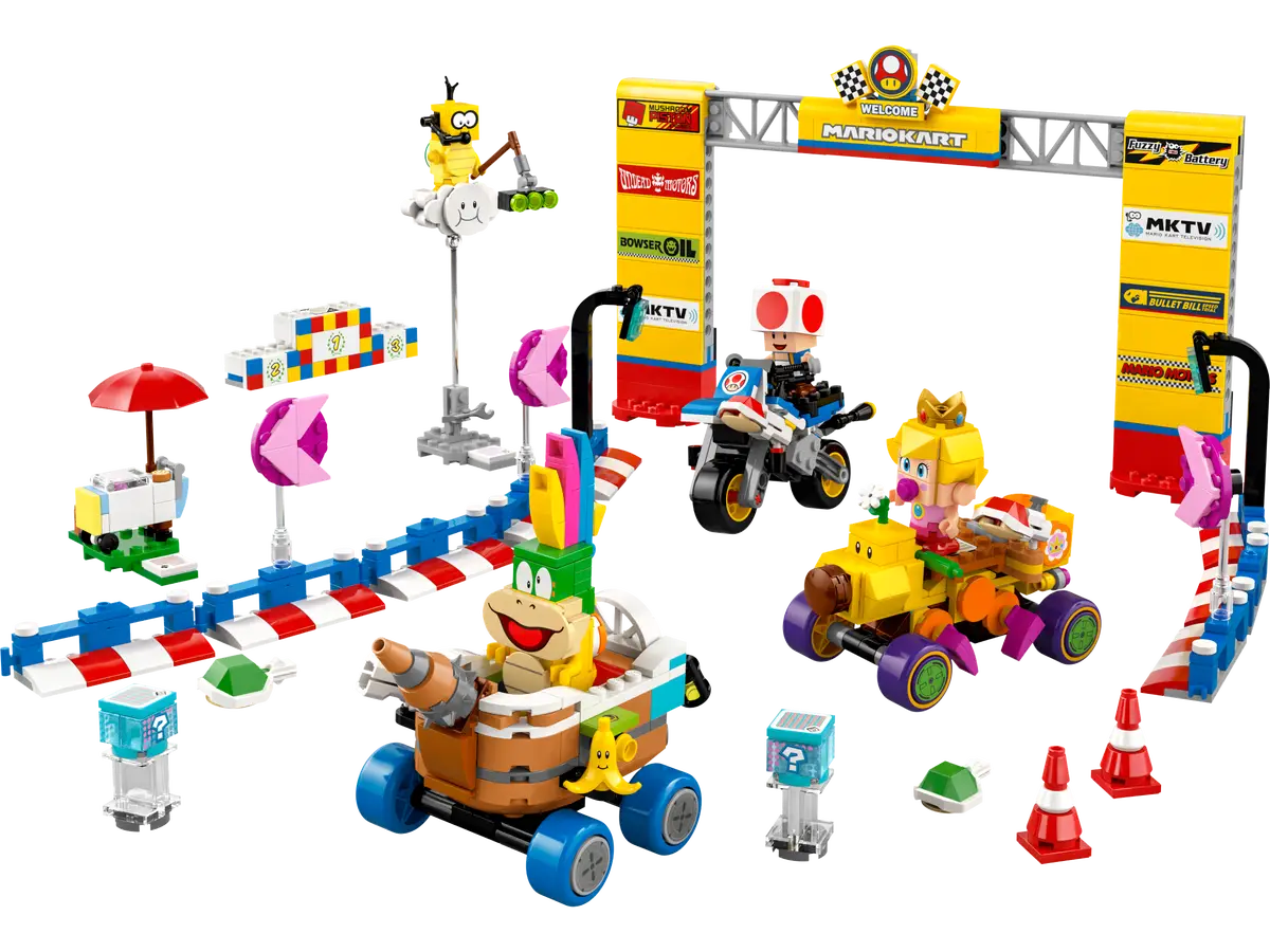 Zestaw Lego Mariokart. Wiele gokartów ścigających się, z Mario, Toadem i księżniczką Peach na pierwszym planie.