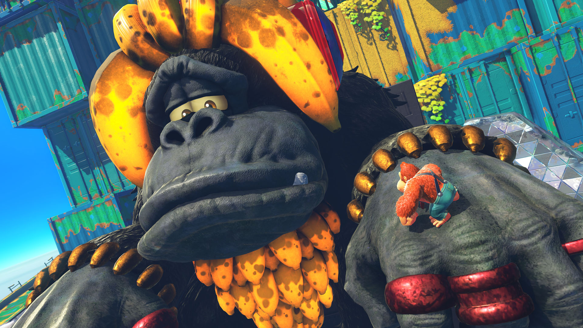 Donkey Kong ve Diddy Kong bir platformda. Renkli arka plan.