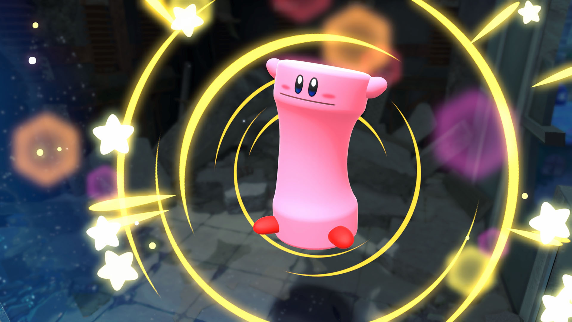 Pembe Kirby benzeri karakter, altın bir spiral ve yıldızlarla çevrili.