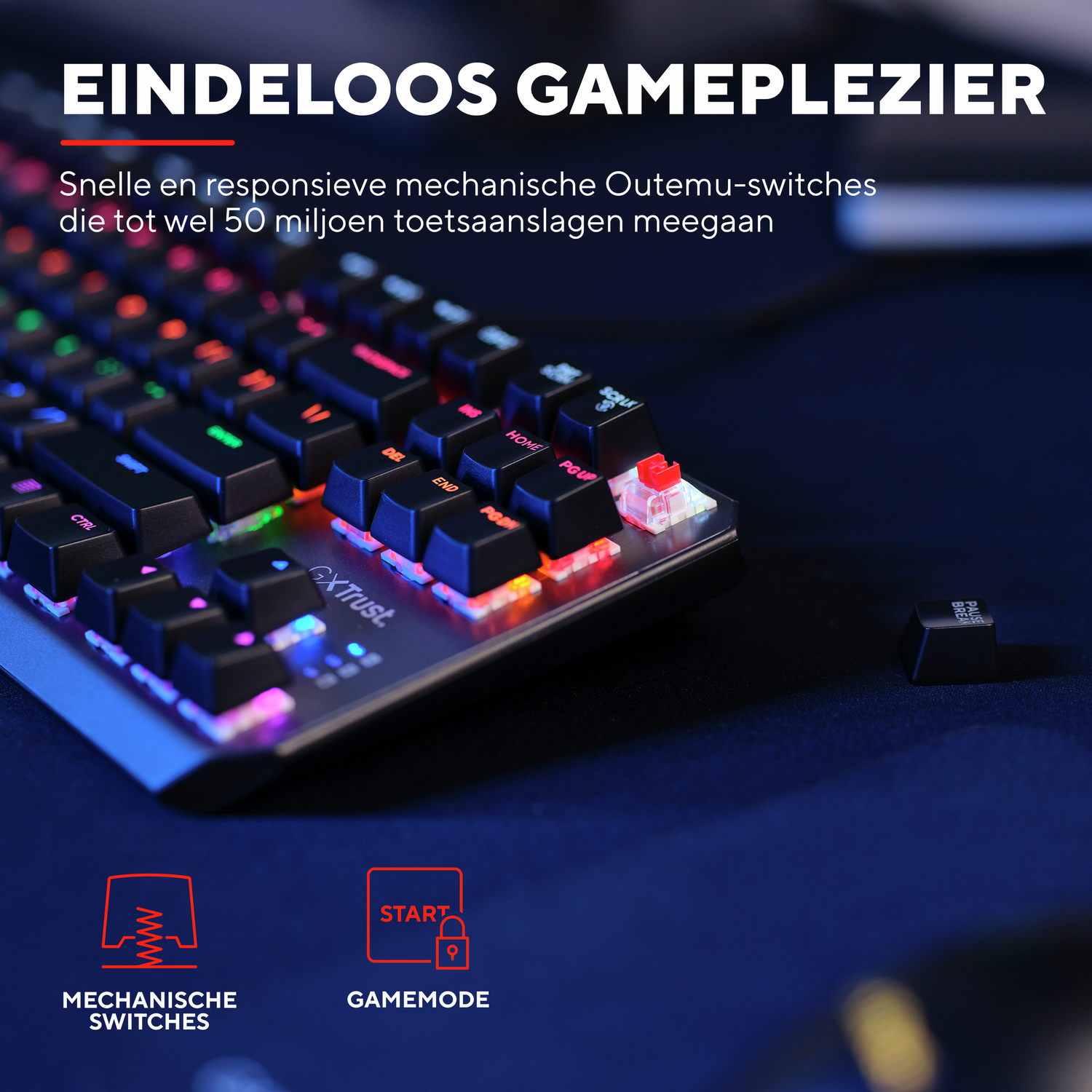 Close-up of gaming keyboard with multicolored keys. Red key caps. Text: 'Eindeloos Gameplezier'.