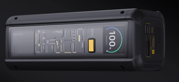 Czarne urządzenie pokazujące 100% wyświetlacz energii elektrycznej.