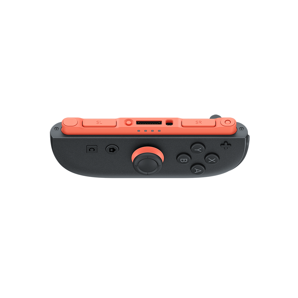 Siyah bir arka plan üzerinde turuncu vurgular ve düğmeleri olan bir Nintendo Switch denetleyicisi.