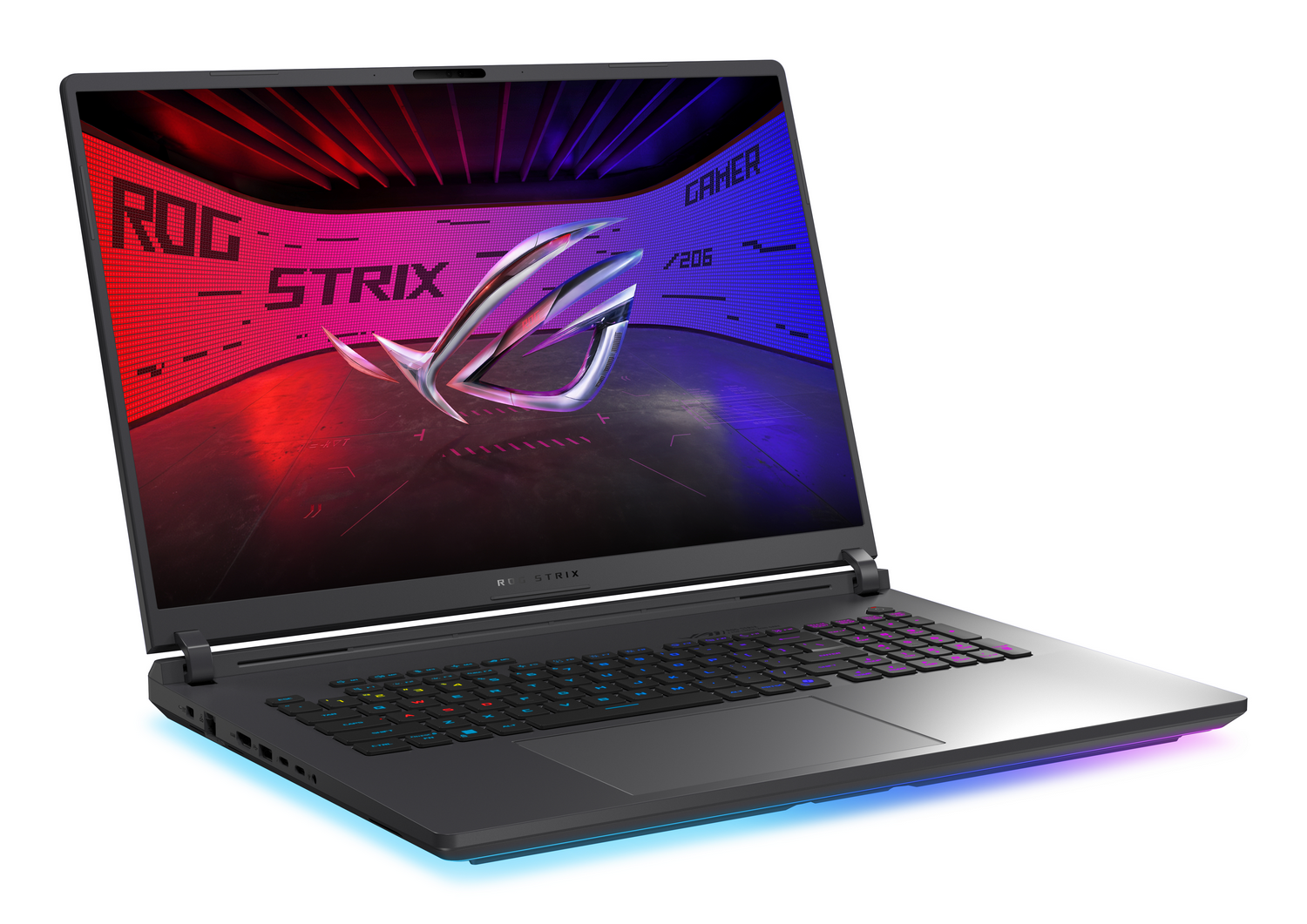 Un portátil negro está abierto. El teclado está retroiluminado y la pantalla muestra un gráfico colorido.