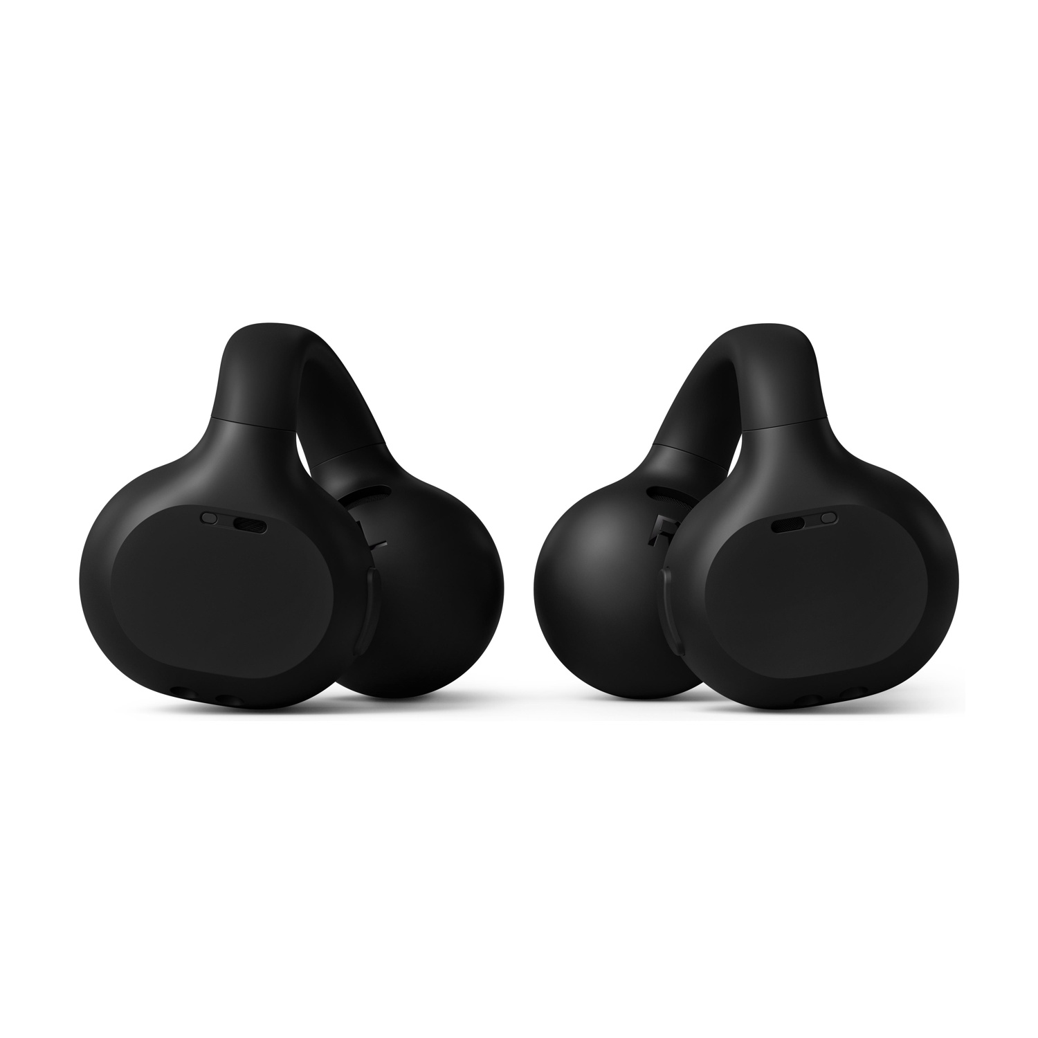 Due cuffie nere su sfondo bianco. Ogni cuffia ha un padiglione auricolare circolare e un archetto curvo.