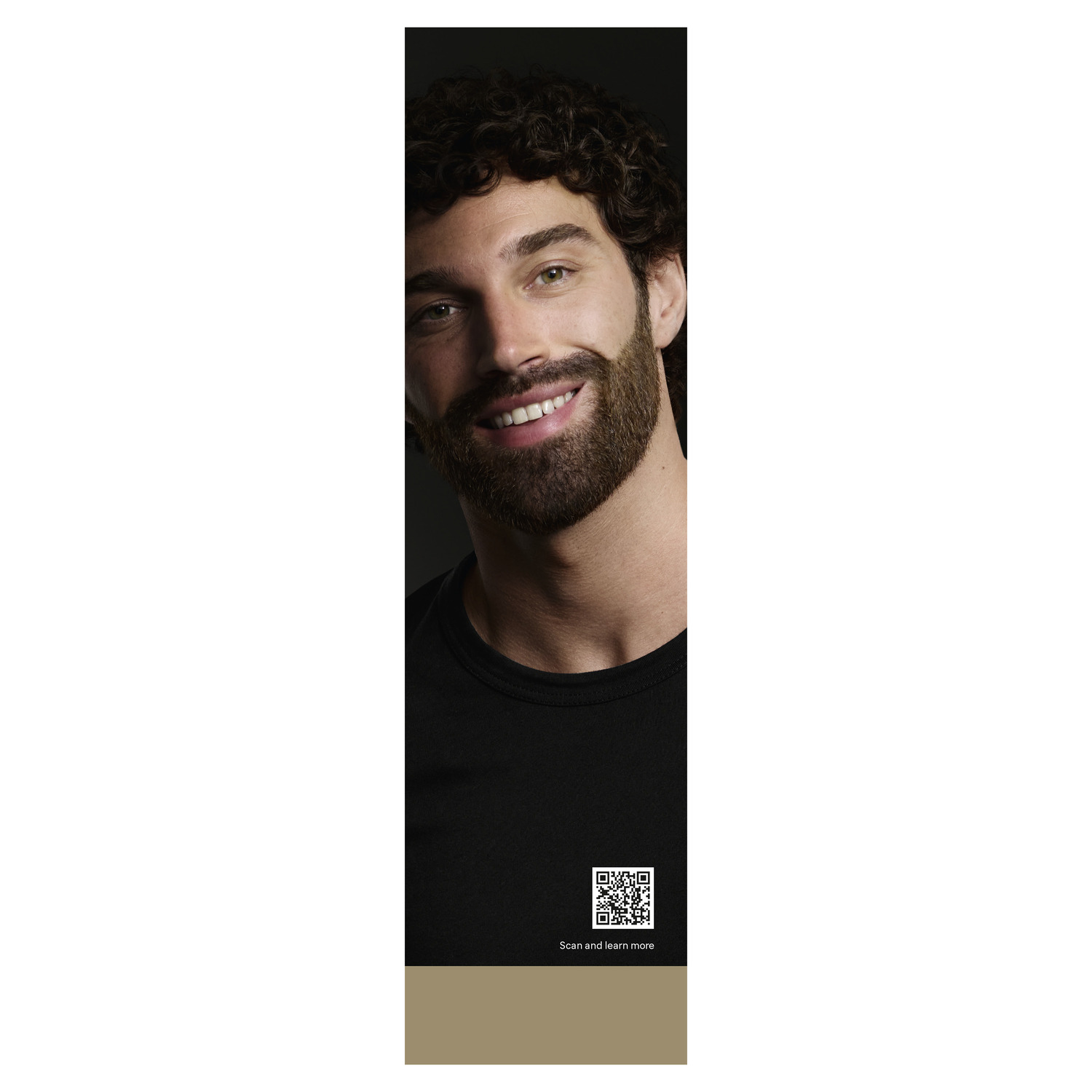 Man with brown beard smiles at the camera. He wears a black shirt. A QR code is below.