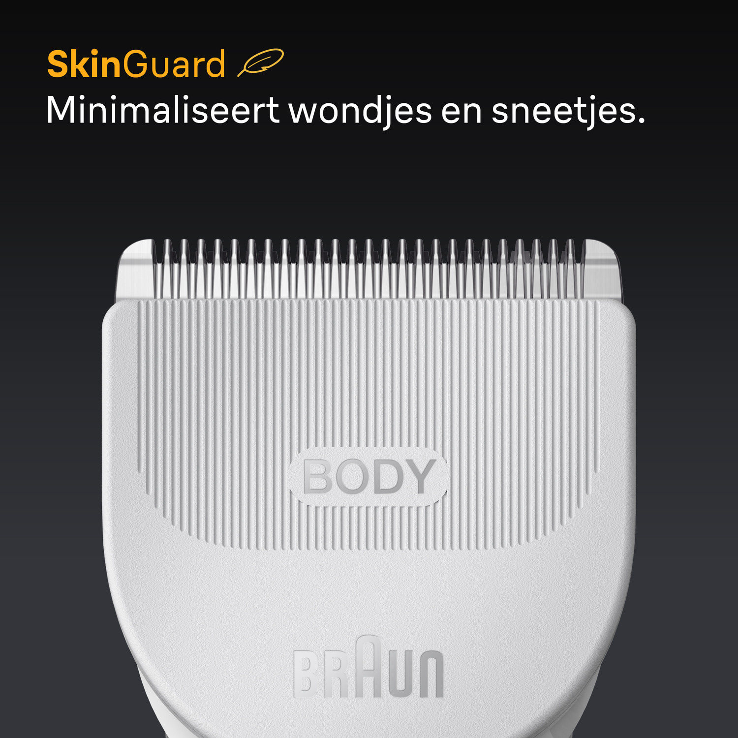 Close-up of a white shaver head with blades and the word 'BODY'.