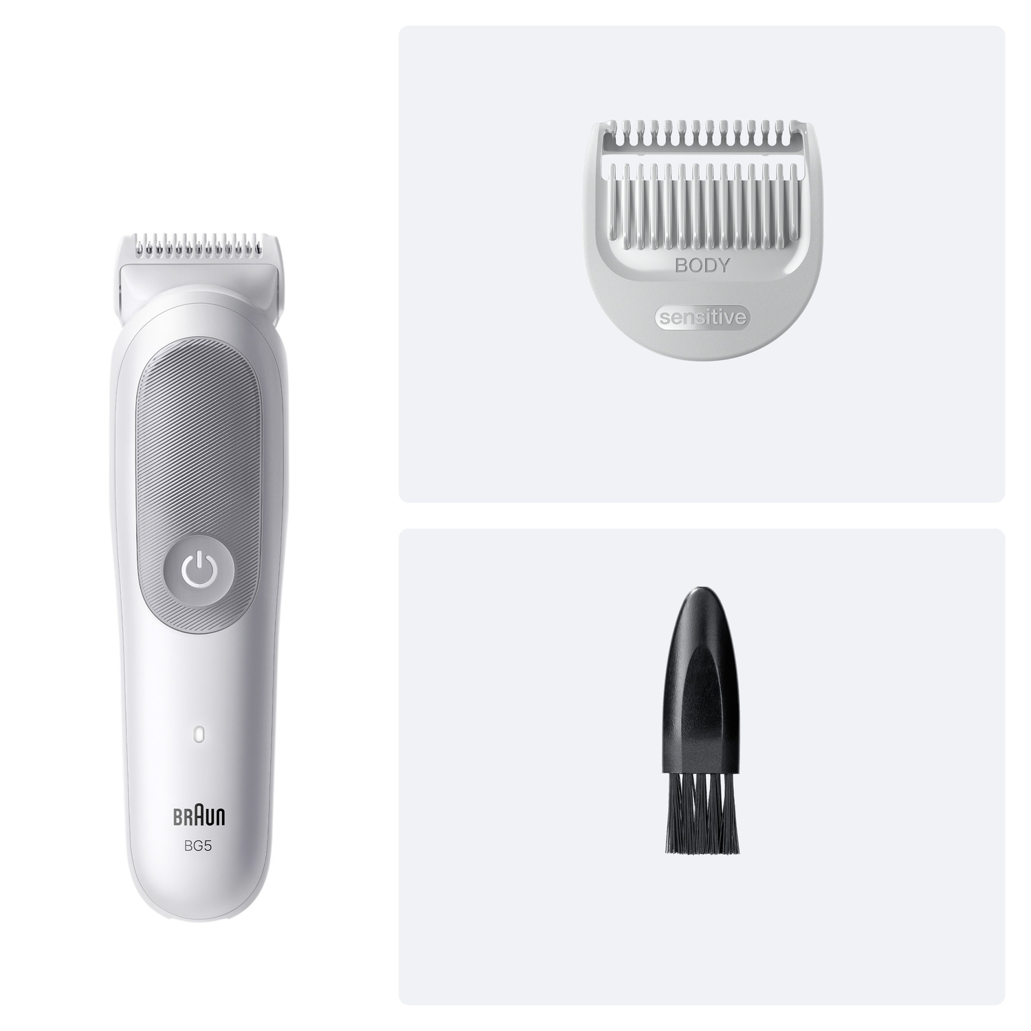 A white shaver, a sensitive comb, and a black cleaning brush are on a light background.
