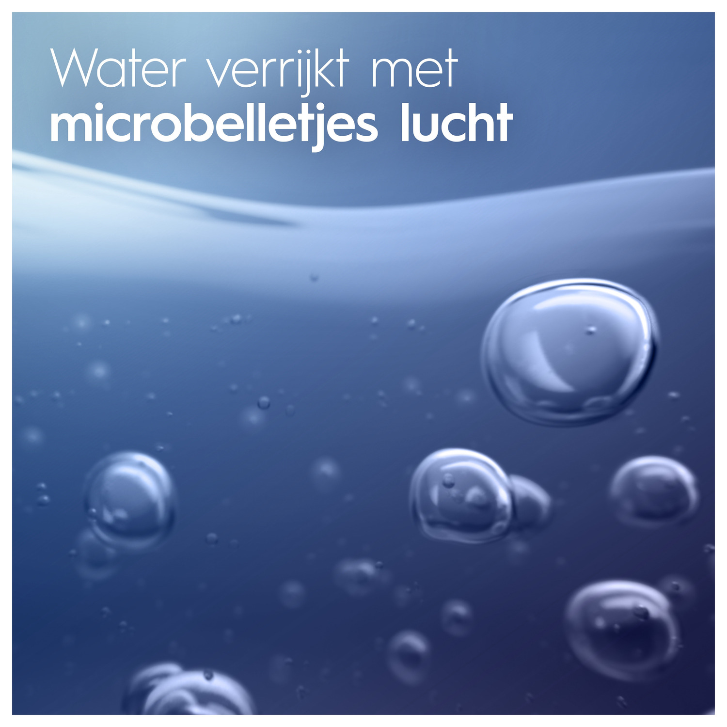 Bubbles in blue liquid, close-up, suggesting water enriched with microbubbles.