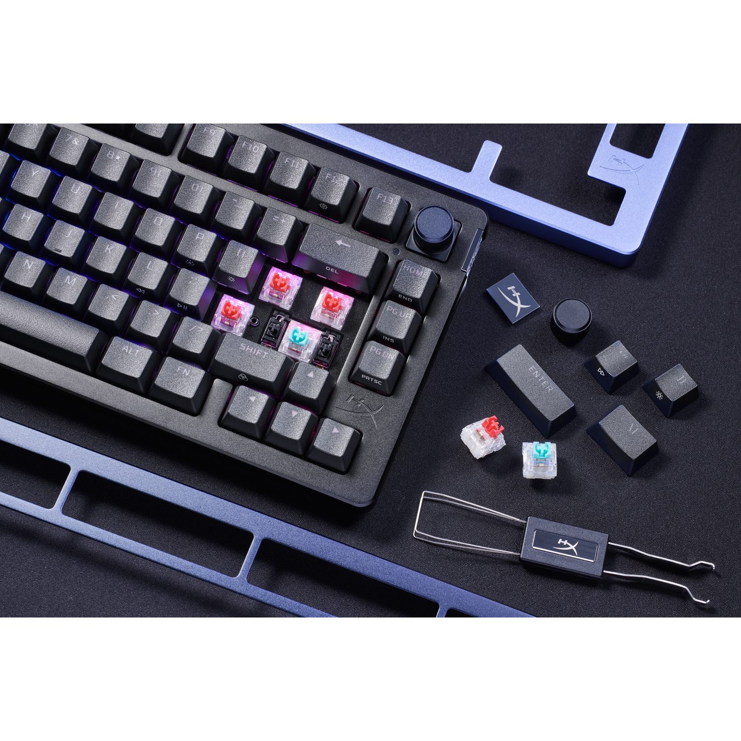Toetsenbordcomponenten: toetsen, schakelaars, frameonderdelen en een keypuller.