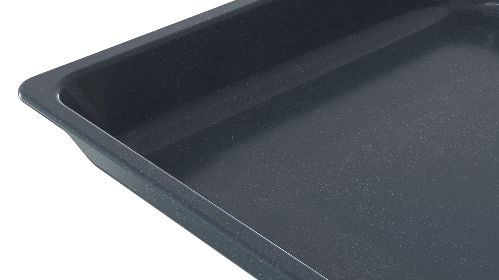 Primer plano de una bandeja de horno gris oscuro. Fondo negro.