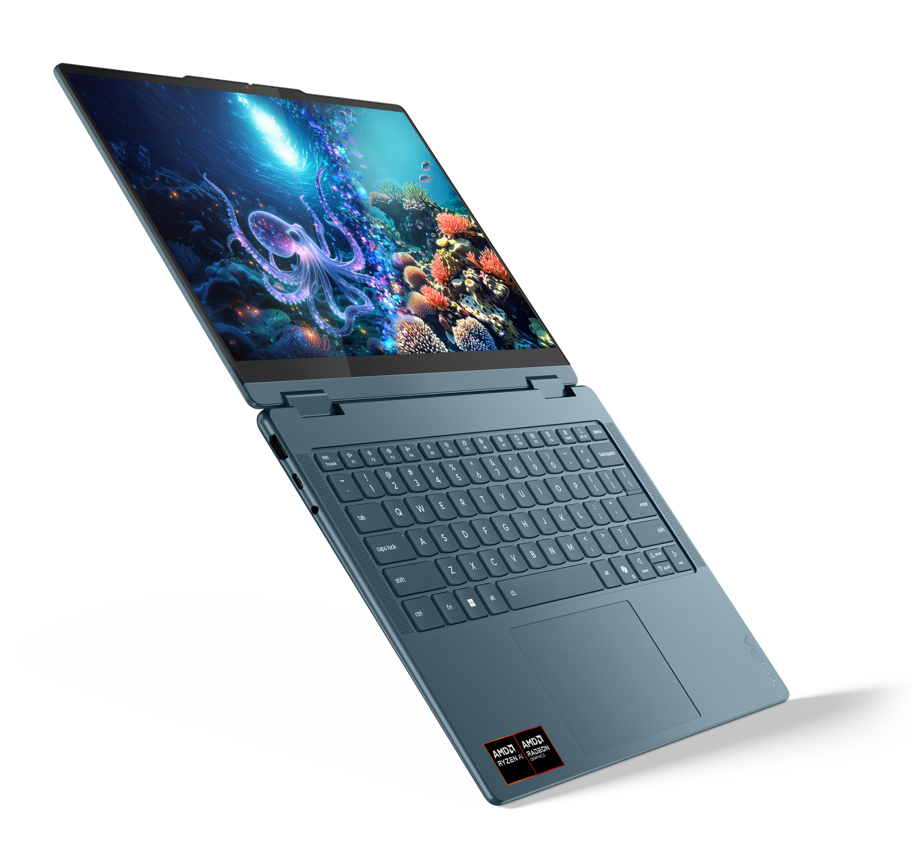 Niebieski laptop Lenovo, otwarty, wyświetlający podwodną scenę z ośmiornicą, widoczna klawiatura.