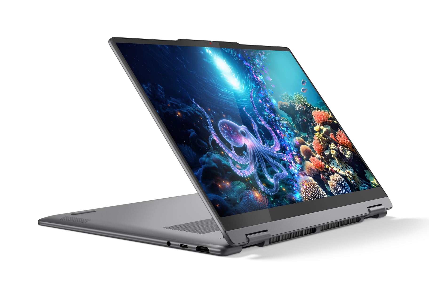 Ekran laptopa wyświetlający podwodną scenę z ośmiornicą i kolorowymi koralowcami.