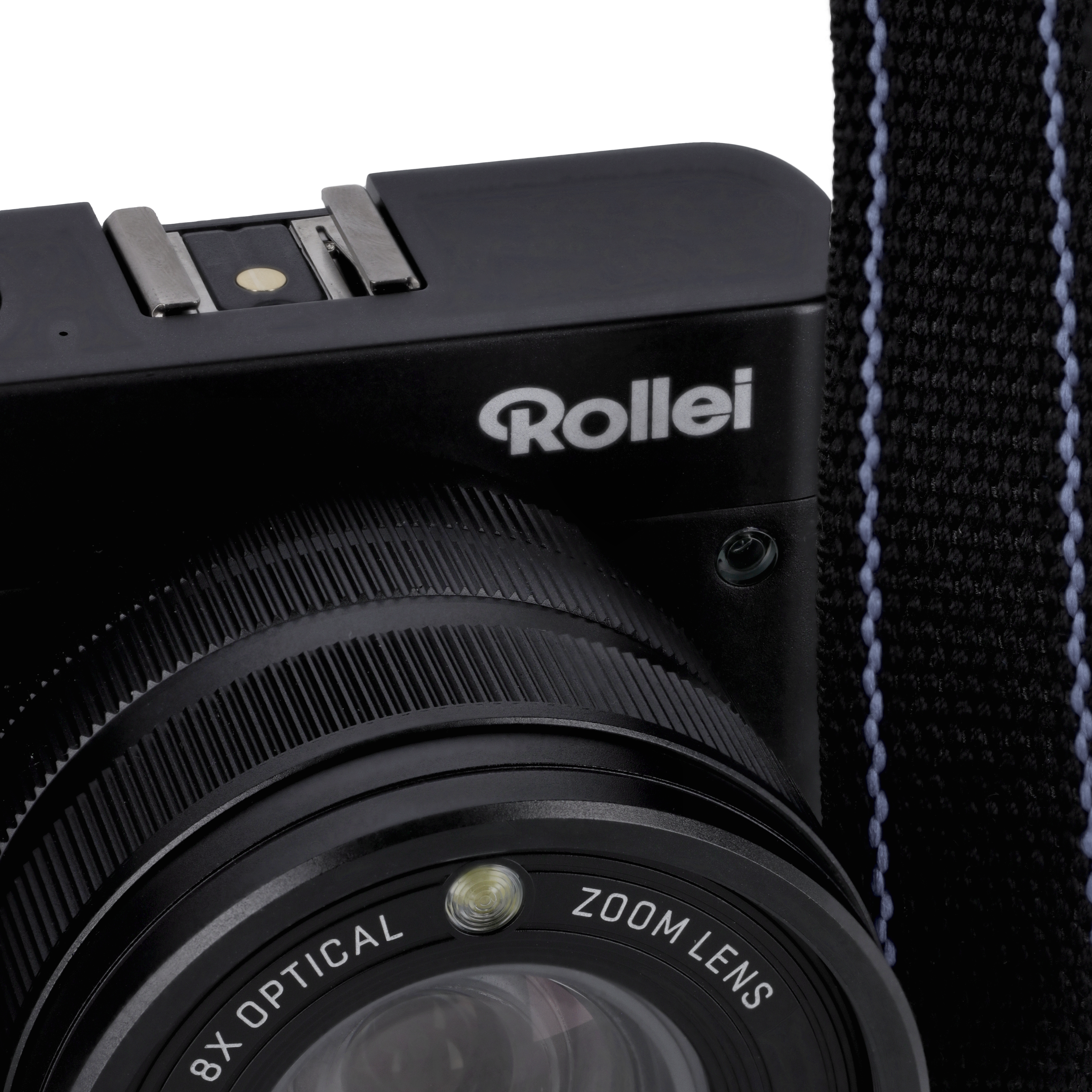 Nahaufnahme einer schwarzen Kamera mit 'Rollei'. Die Linse ist mit 'ZOOM LENS' beschriftet.