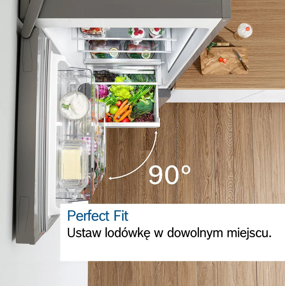 Lodówka otwarta pod kątem 90 stopni. Tekst: Perfect Fit. Ustaw lodówkę w dowolnym miejscu.