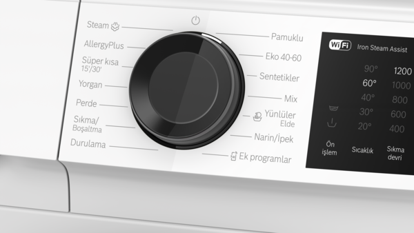 Bir Bosch çamaşır makinesindeki kontrol kadranının yakın çekimi, program seçeneklerini gösteriyor.