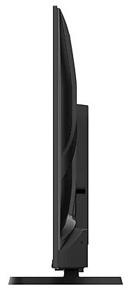 Widok z boku czarnego telewizora na podstawie. Smukły profil.