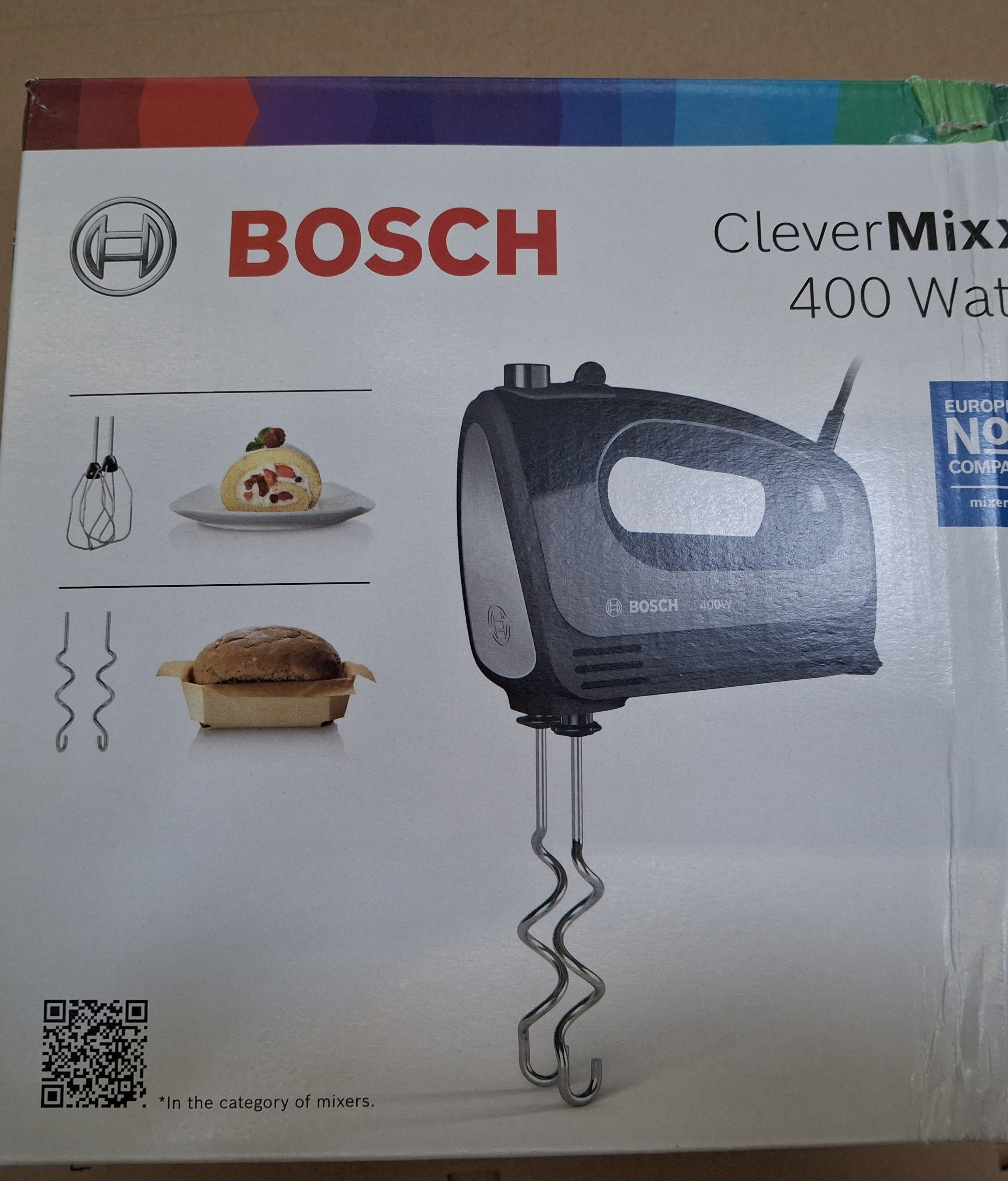 Pudełko z mikserem Bosch CleverMixx. Jest zdjęcie miksera i próbek żywności. Pudełko jest białe.
