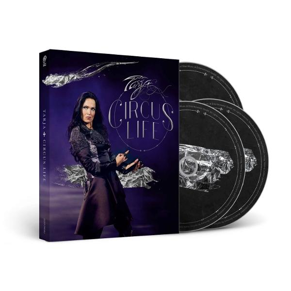 Tarja album borítója, melyen sötét ruhában látható, CD-kkel.