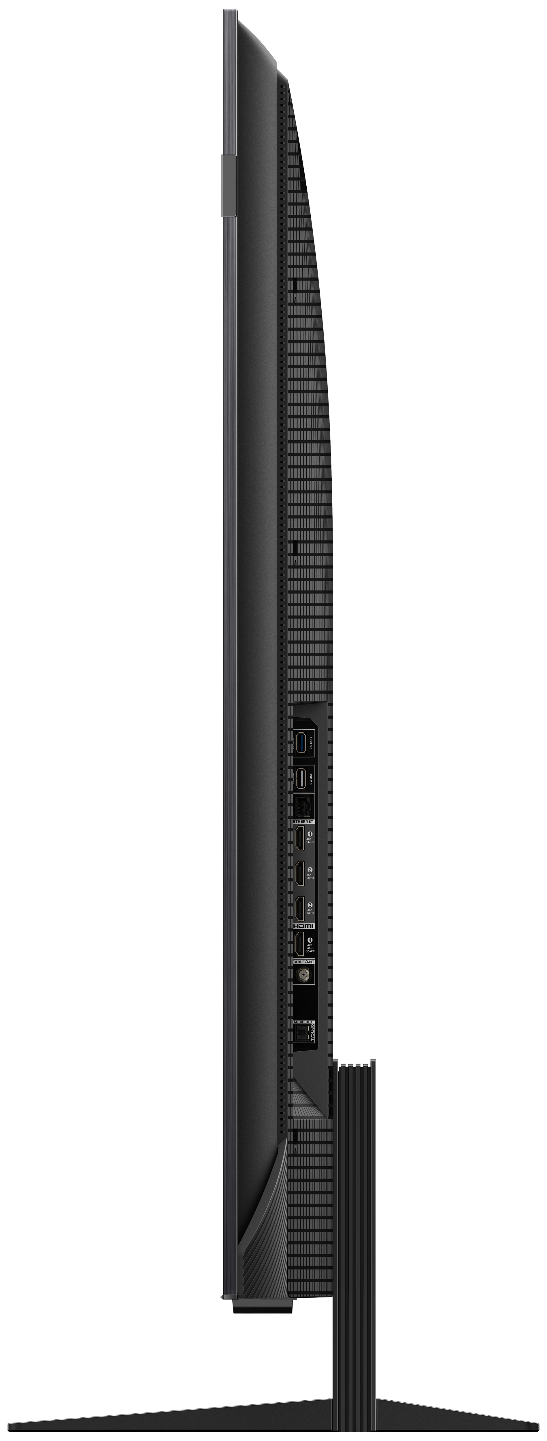Vue latérale d'une télévision noire. Il a un pied et différents ports visibles.