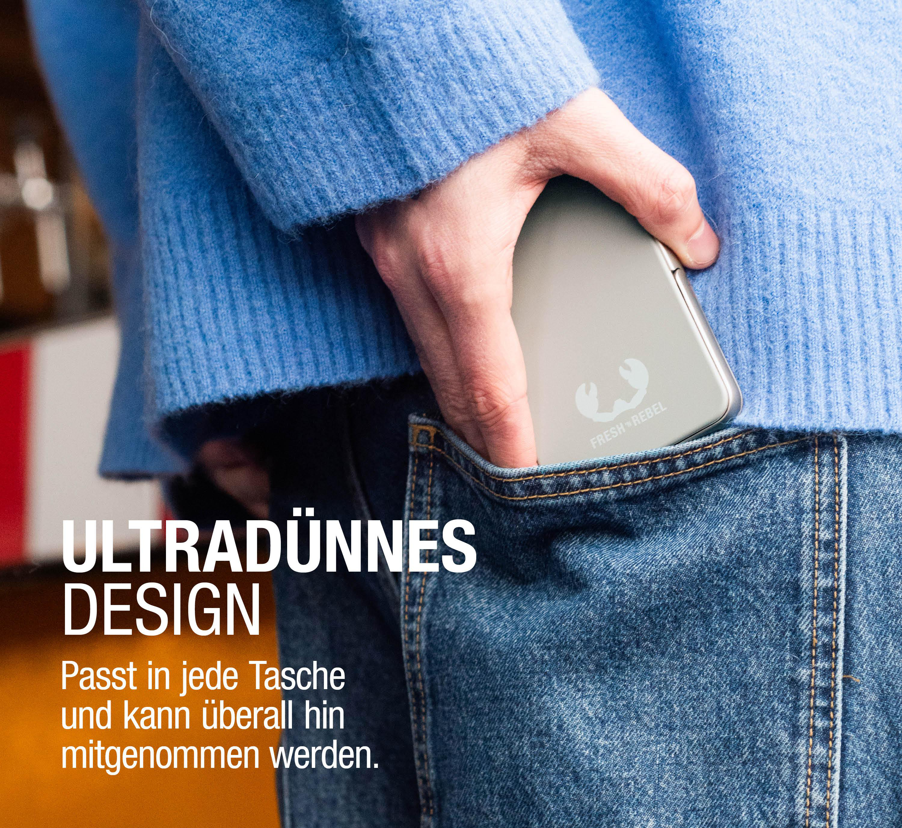 Hand steckt Gerät in Tasche. Text: Ultradünnes Design. Passt in jede Tasche.