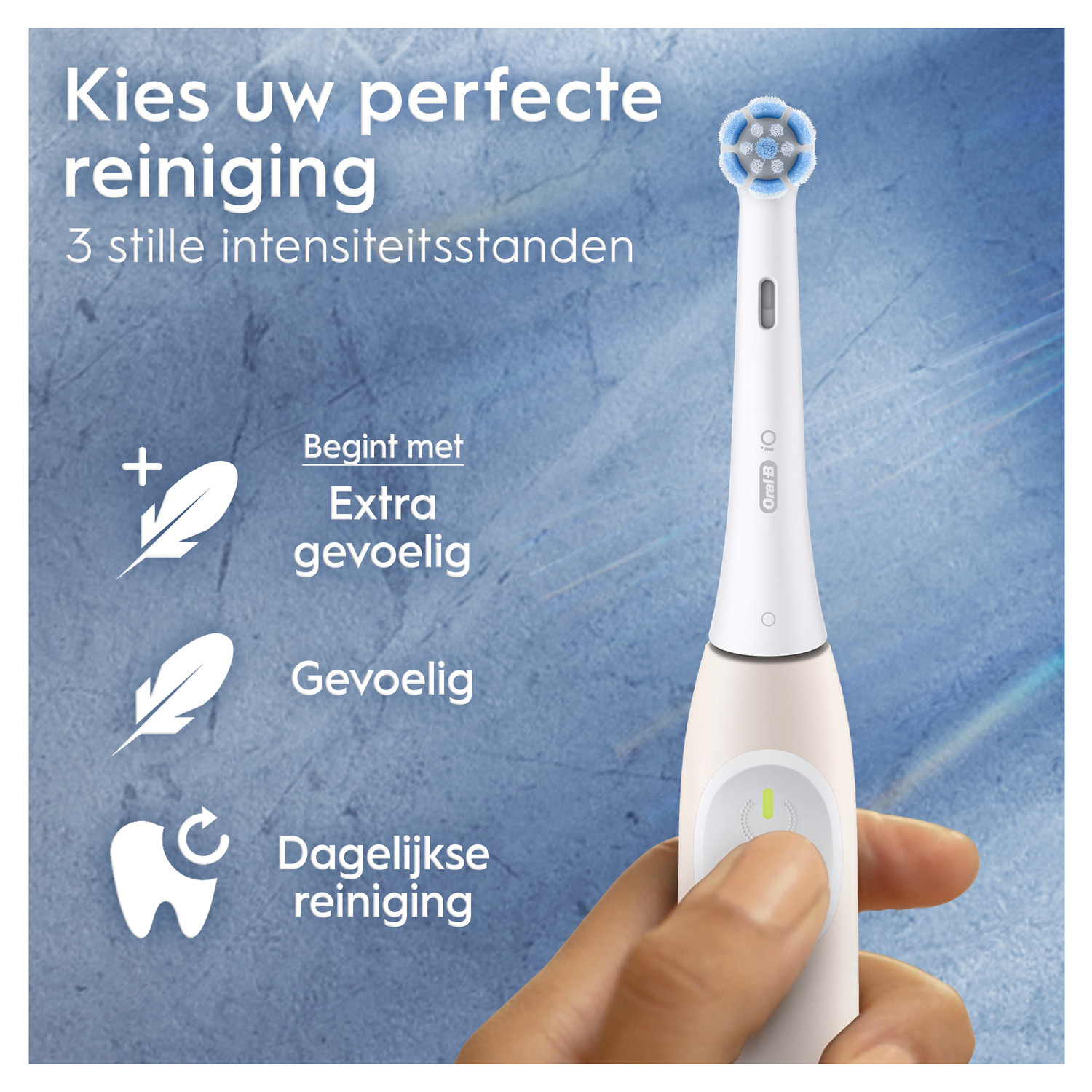 An electric toothbrush held by a hand. Options include extra sensitive, sensitive, and daily clean settings.