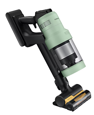 Jasnozielony i czarny odkurzacz bezprzewodowy, ustawiony pod kątem na białym tle.