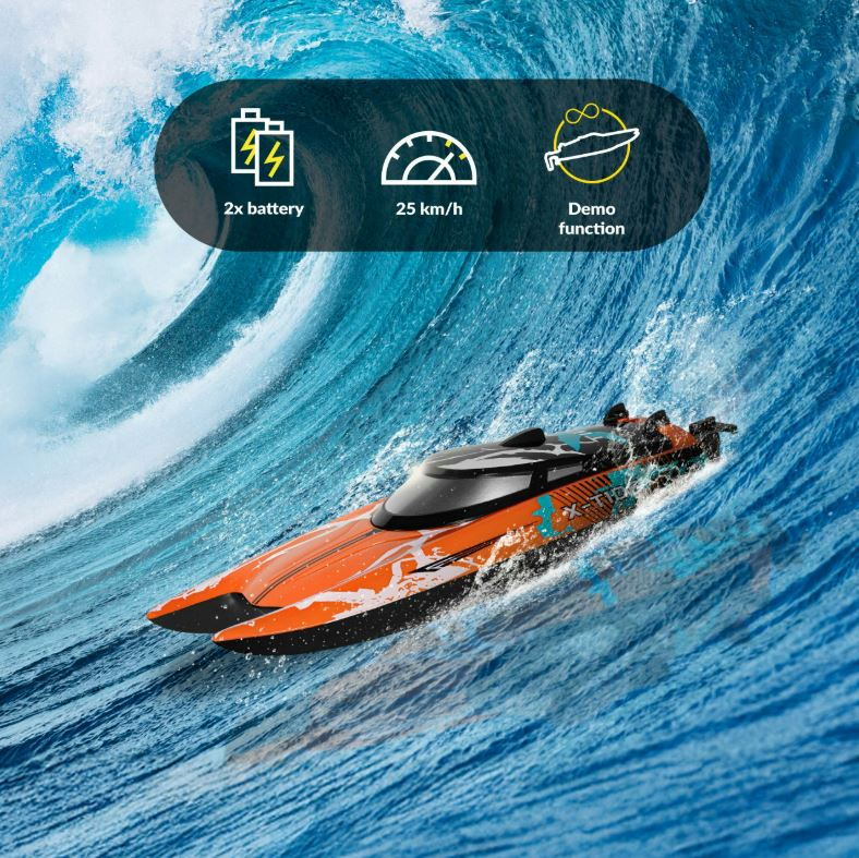 Pomarańczowa łódź na wodzie. Cechy: 2x bateria, prędkość 25 km/h i funkcja demo.