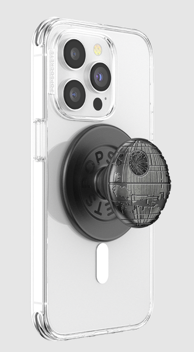 Eine transparente Handyhülle mit Death Star PopSockets-Griff, vor grauem Hintergrund.