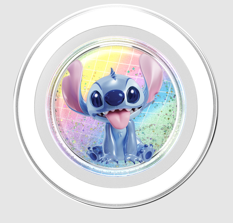 Stitch-Zeichentrickfigur, blau mit großen Ohren und herausgestreckter Zunge, in einem kreisförmigen, weißen Rahmen mit buntem Hintergrund.