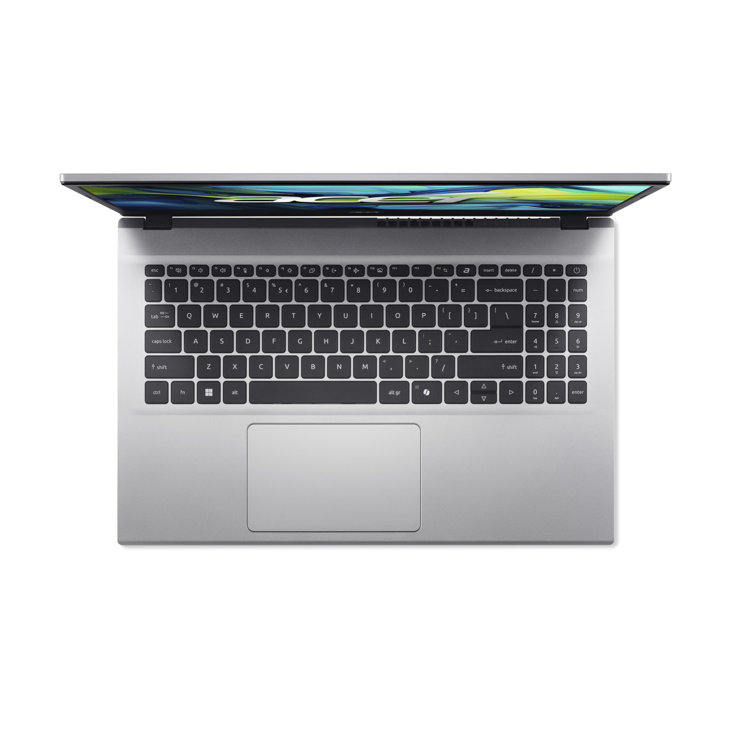 Vue de dessus d'un ordinateur portable argenté avec écran ouvert, montrant clavier et pavé tactile, sur fond blanc.