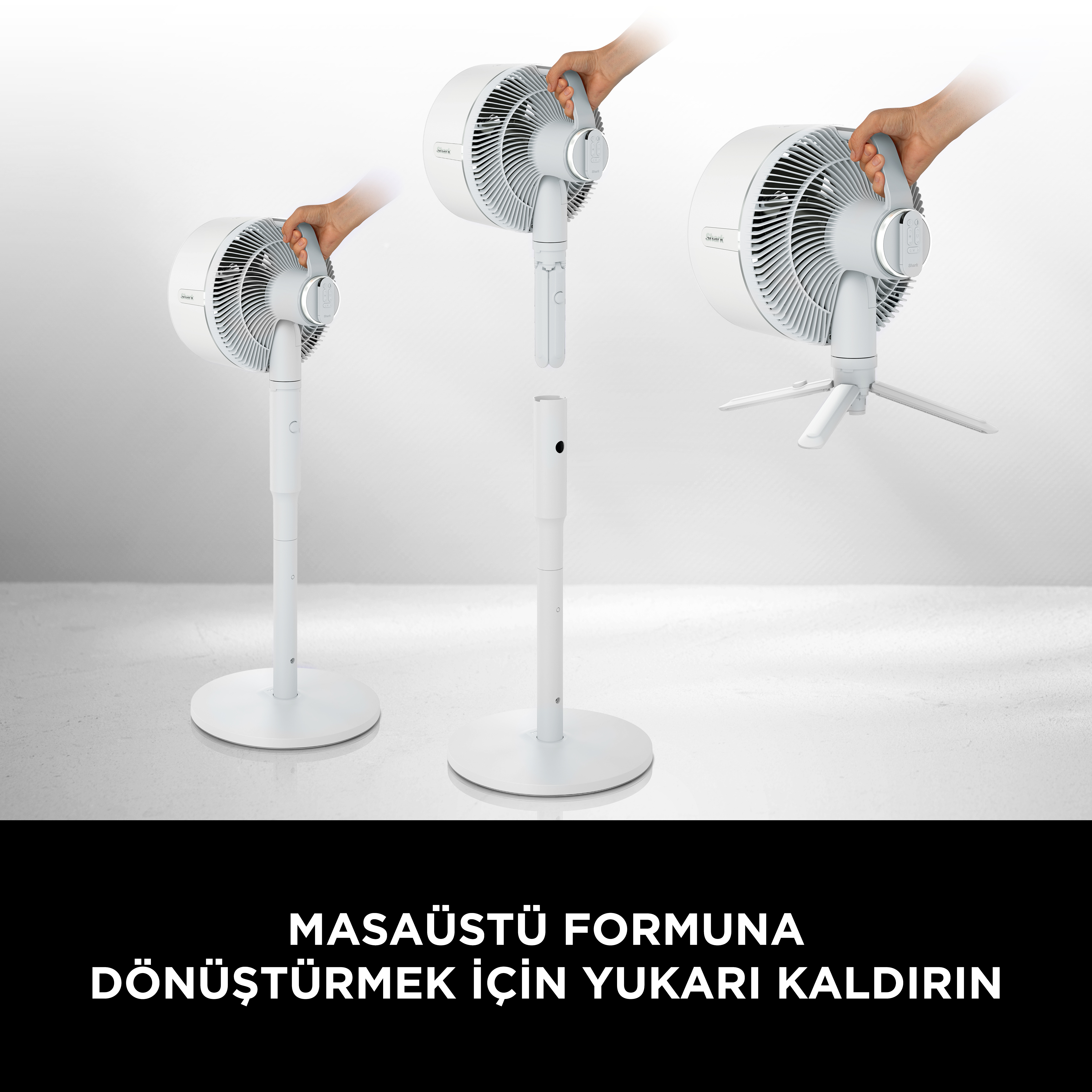 Beyaz bir vantilatörü yerden masaya yeniden yapılandıran eller.