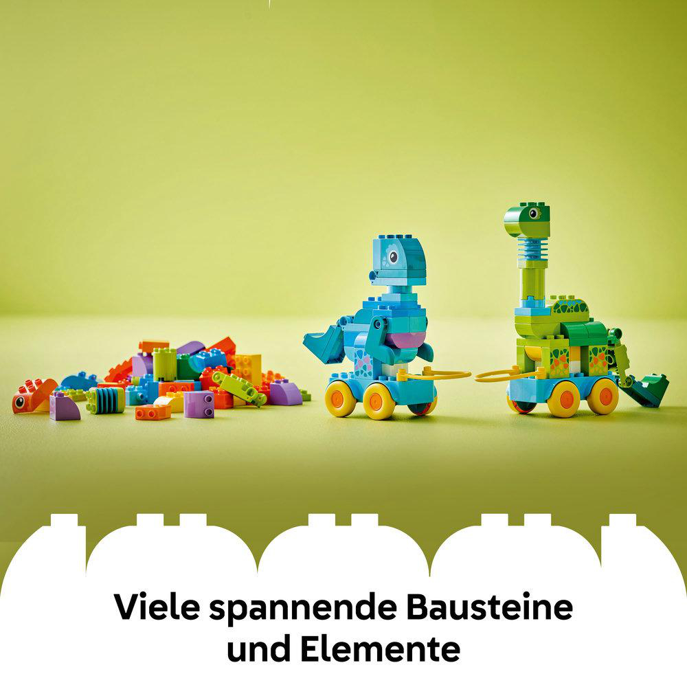 Zwei Spielzeug-Dinosaurierfiguren aus bunten Blöcken, mit losen Blöcken im Hintergrund.