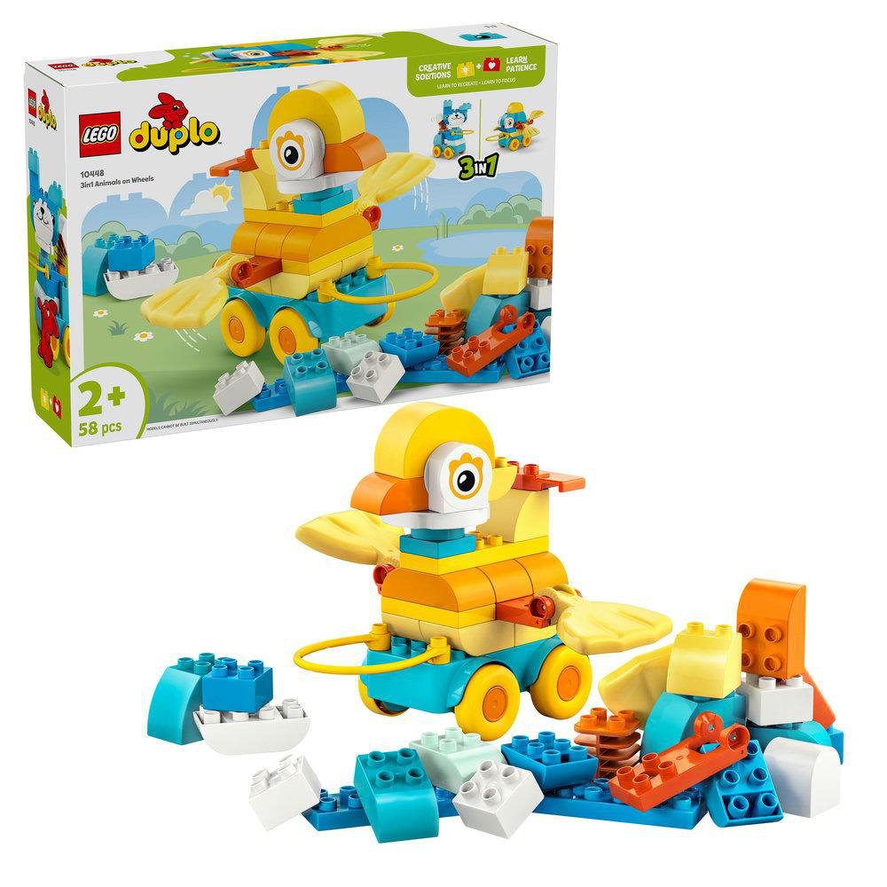 Lego Duplo Set. Eine gelbe Ente auf Rädern, mit blauen und orangen Blöcken.