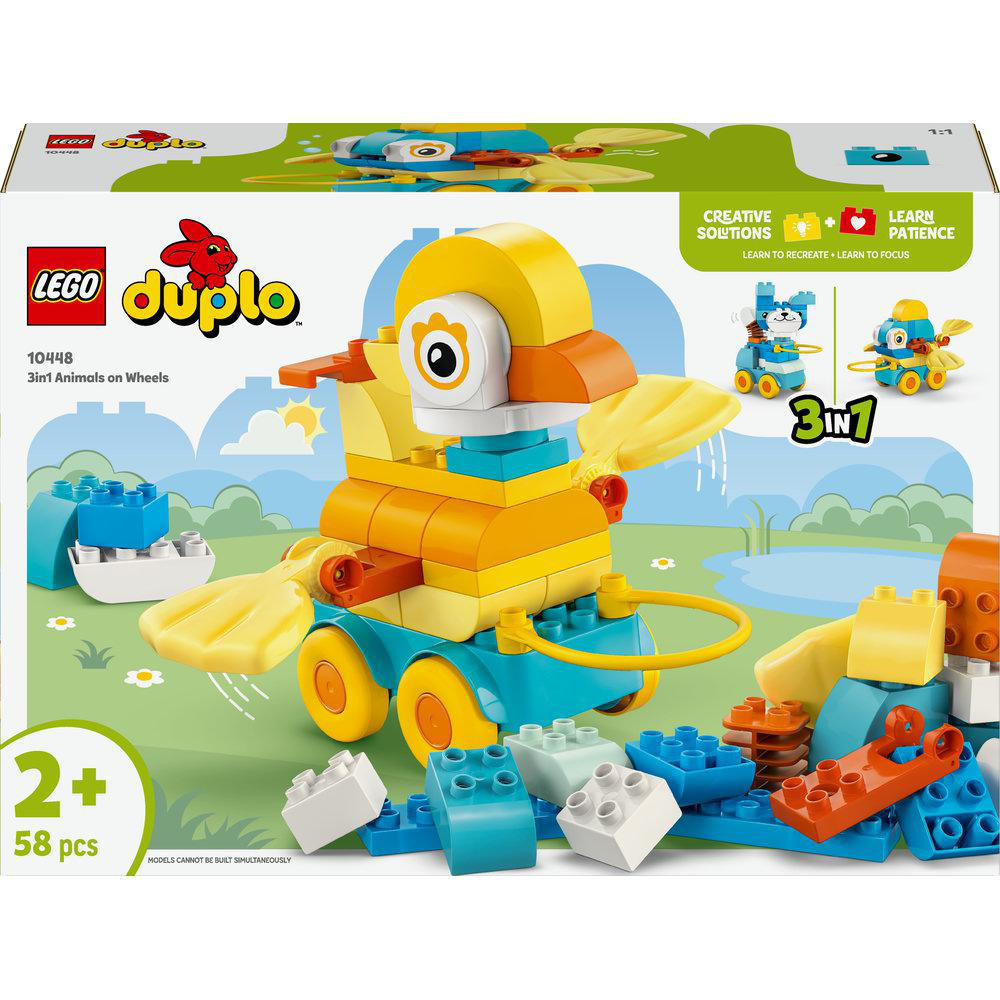 Lego Duplo Set Box mit einem gebauten Entenspielzeug. Teile sind um das Spielzeug herum verstreut.