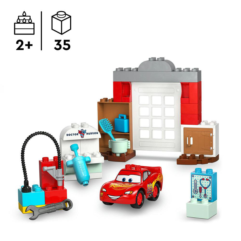 Lego Duplo Set, rotes Auto und Gebäude. Enthält Garage, Werkzeuge und Doctor Hudson Schild.