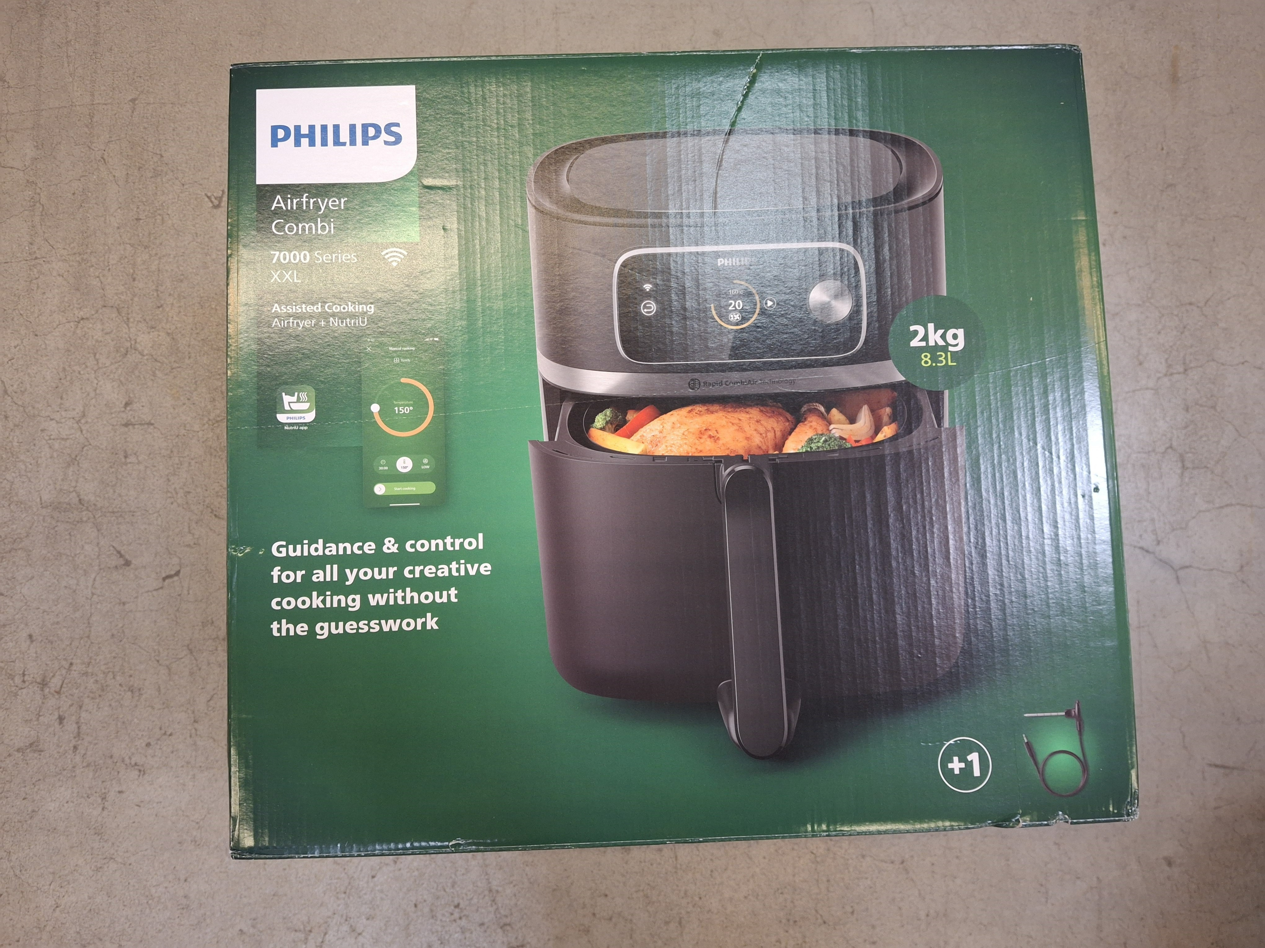 Pudełko Philips Airfryer Combi. Pokazuje produkt i jedzenie. Tekst mówi o wskazówkach i kontroli dla kreatywnego gotowania.