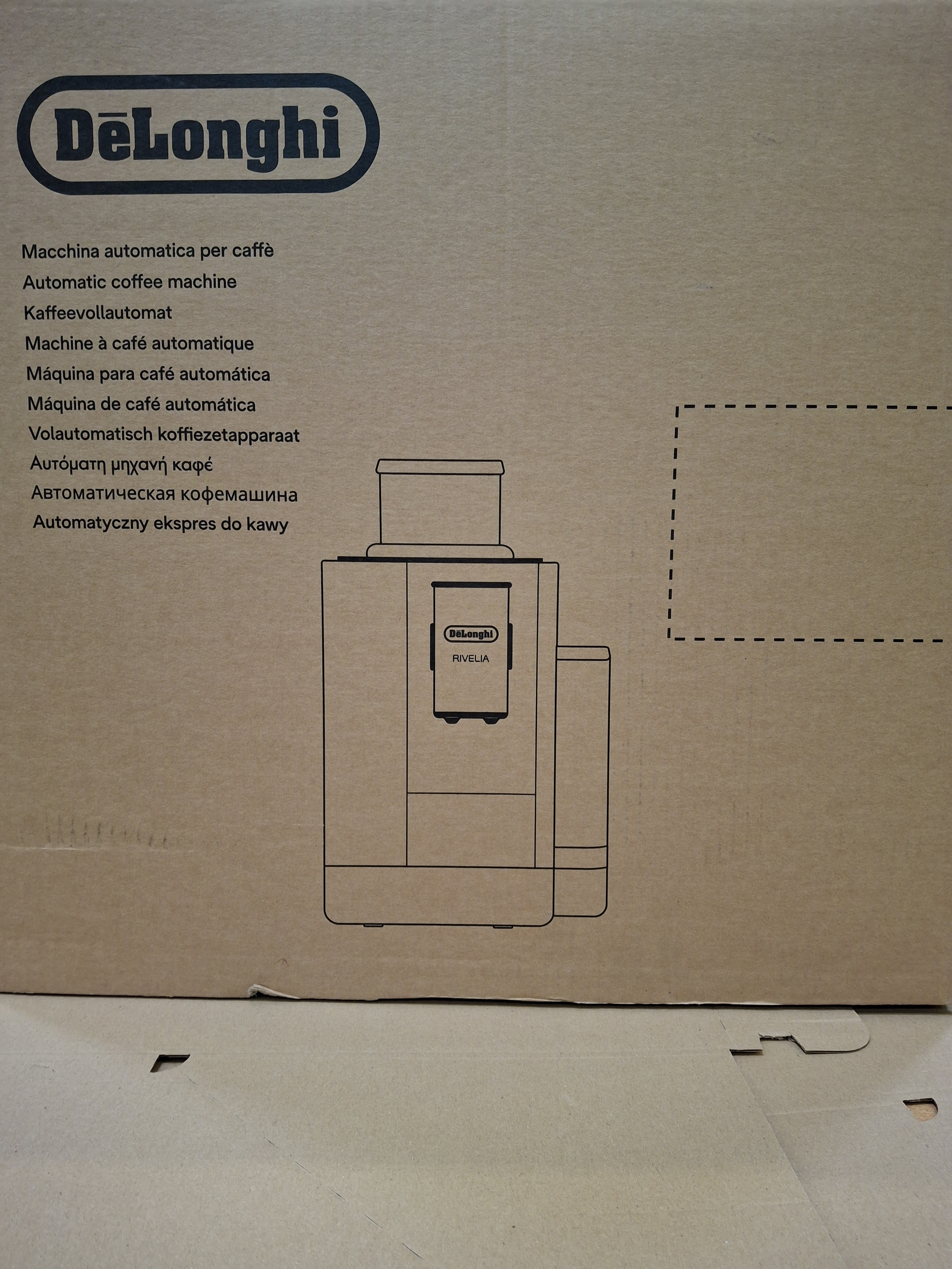 Pudełko do automatycznego ekspresu do kawy DeLonghi Nivella. Zawiera rysunek maszyny i tekst w wielu językach.