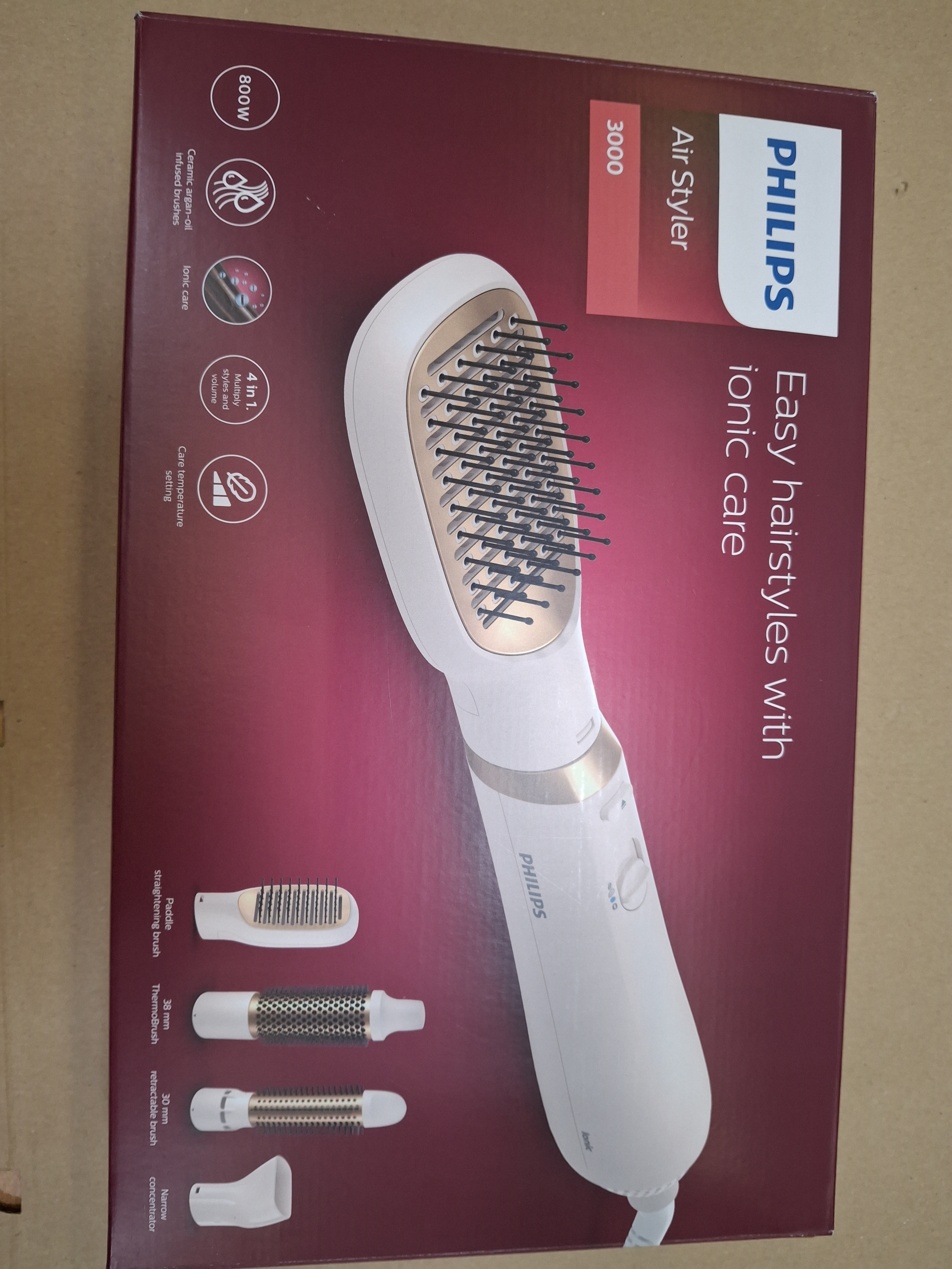 Pudełko Philips Air Styler 3000. Pudełko przedstawia styler i jego nasadki.