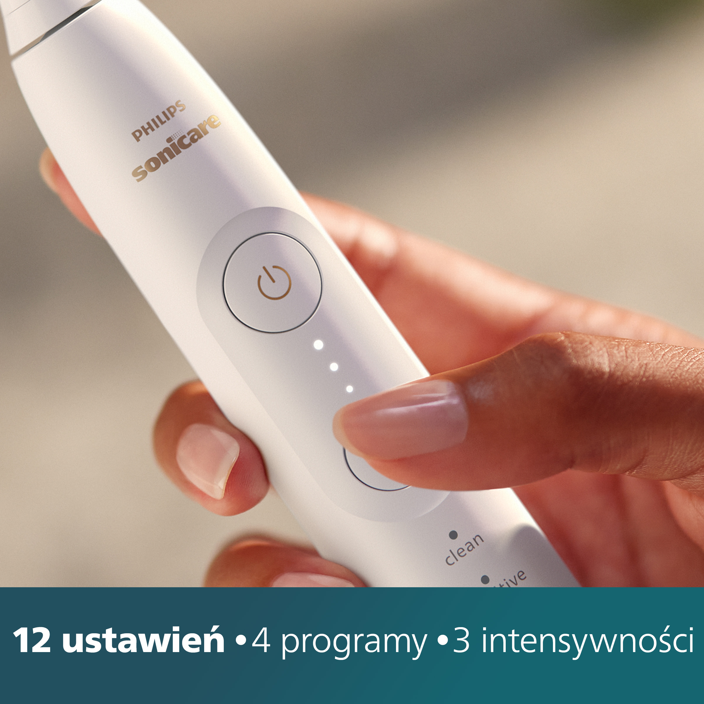 Ręka trzymająca białą szczoteczkę Philips Sonicare, pokazująca ustawienia: 12 ustawień, 4 programy i 3 intensywności.