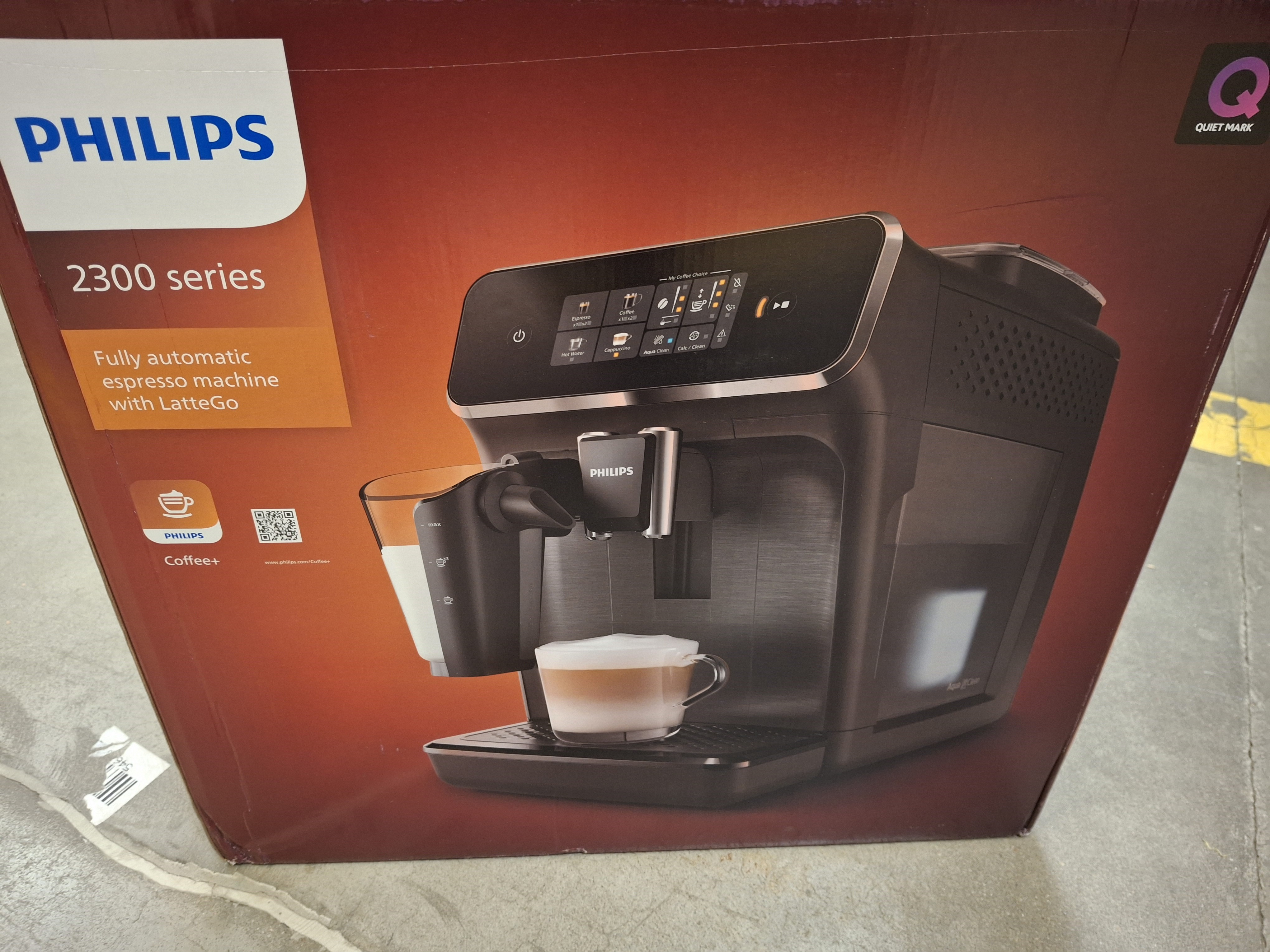 Ekspres Philips serii 2300. Pudełko pokazuje latte. Kolory czarny i srebrny.
