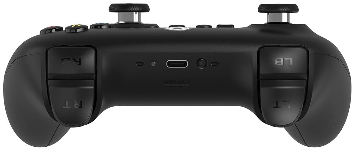 Czarny kontroler Xbox, widok z tyłu, z wyraźnie widocznymi przyciskami i portami.