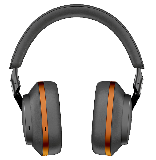 Czarne i szare słuchawki z pomarańczowymi akcentami. Konstrukcja zamknięta. Czarne tło.