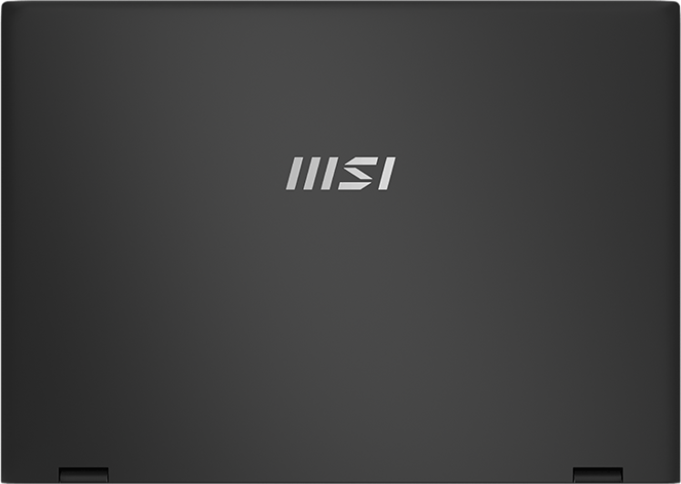 Laptop, felülnézet, zárt, MSI logóval a fedélen. Háttér: fekete.
