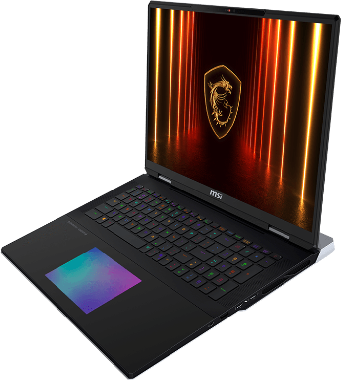 Fekete laptop, szögben nyitott, világító billentyűzettel és sárkány logóval.