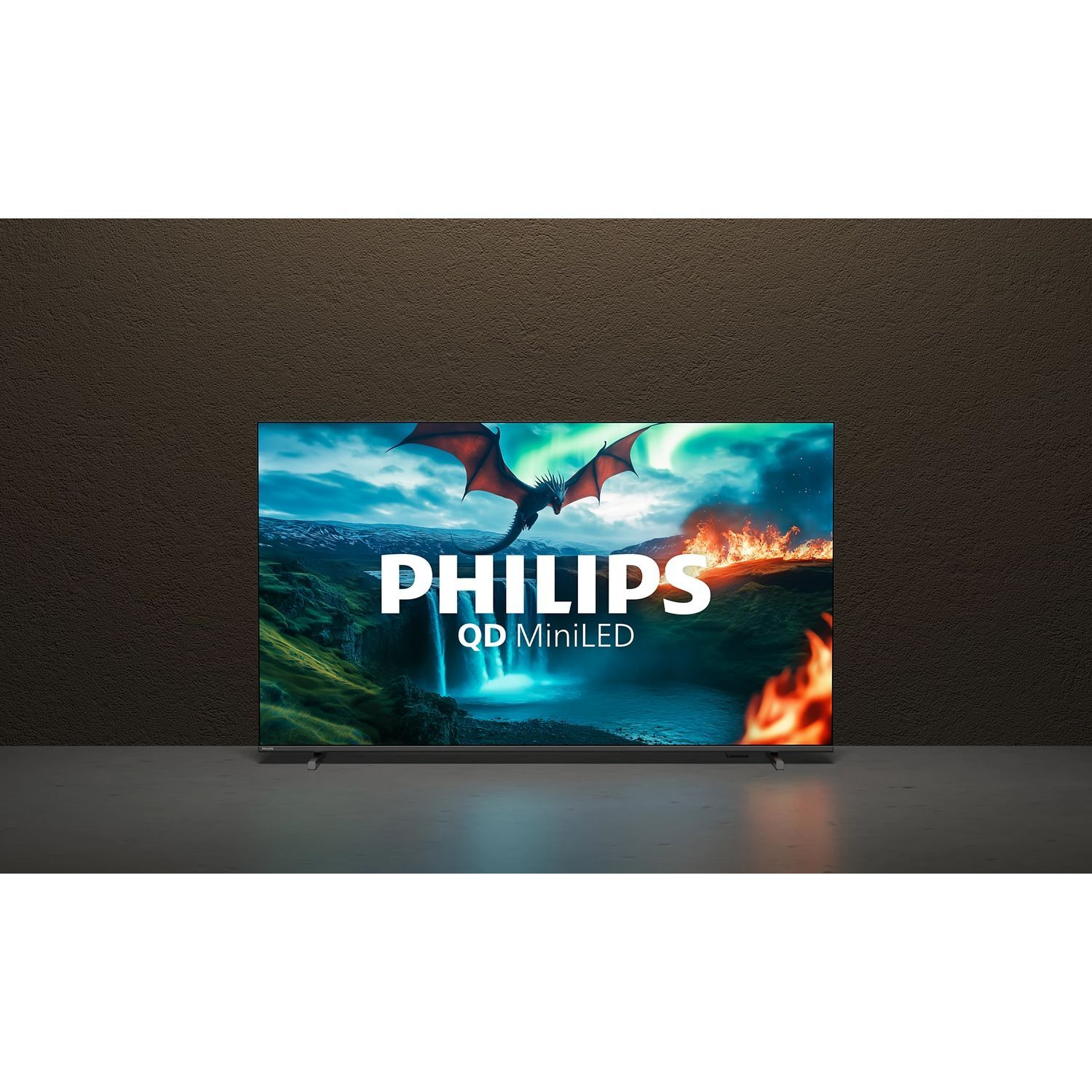 Philips MiniLED TV toont een draak over een waterval en vuur. Op een donker oppervlak tegen een bruine muur.