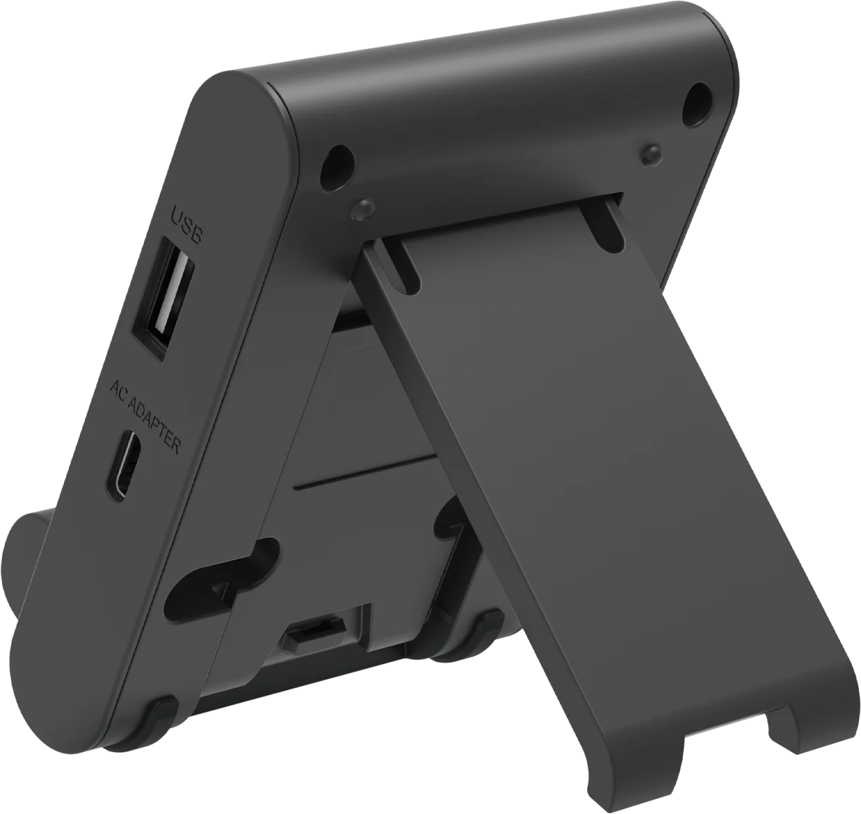 Primo piano di un supporto nero per Nintendo Switch, che mostra le porte USB e adattatore CA.