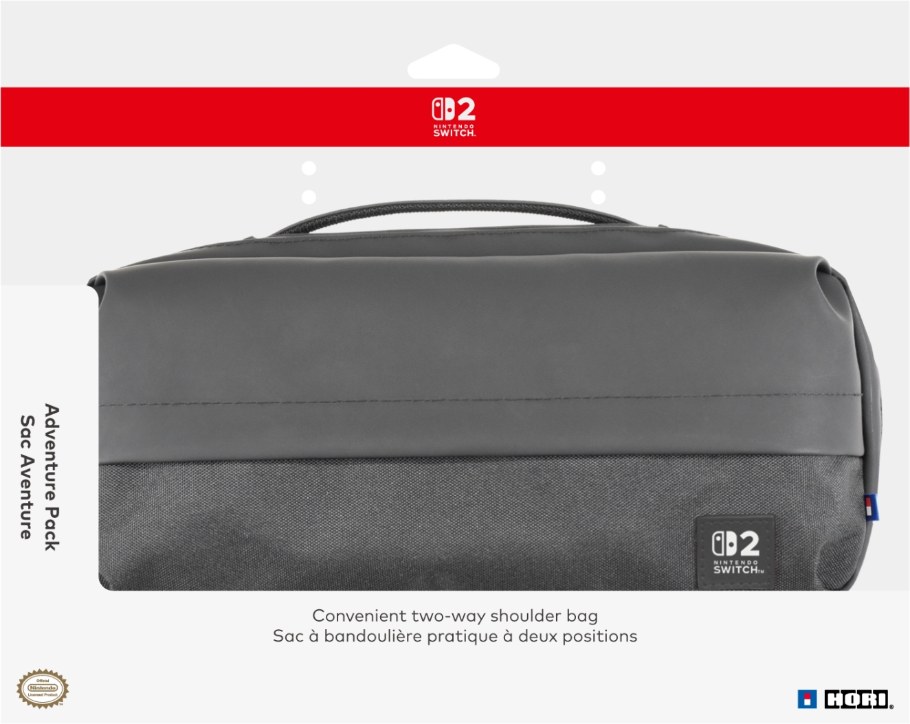 Viene mostrata una custodia grigia per Nintendo Switch. Il testo recita: Adventure Pack e Sac Aventure.