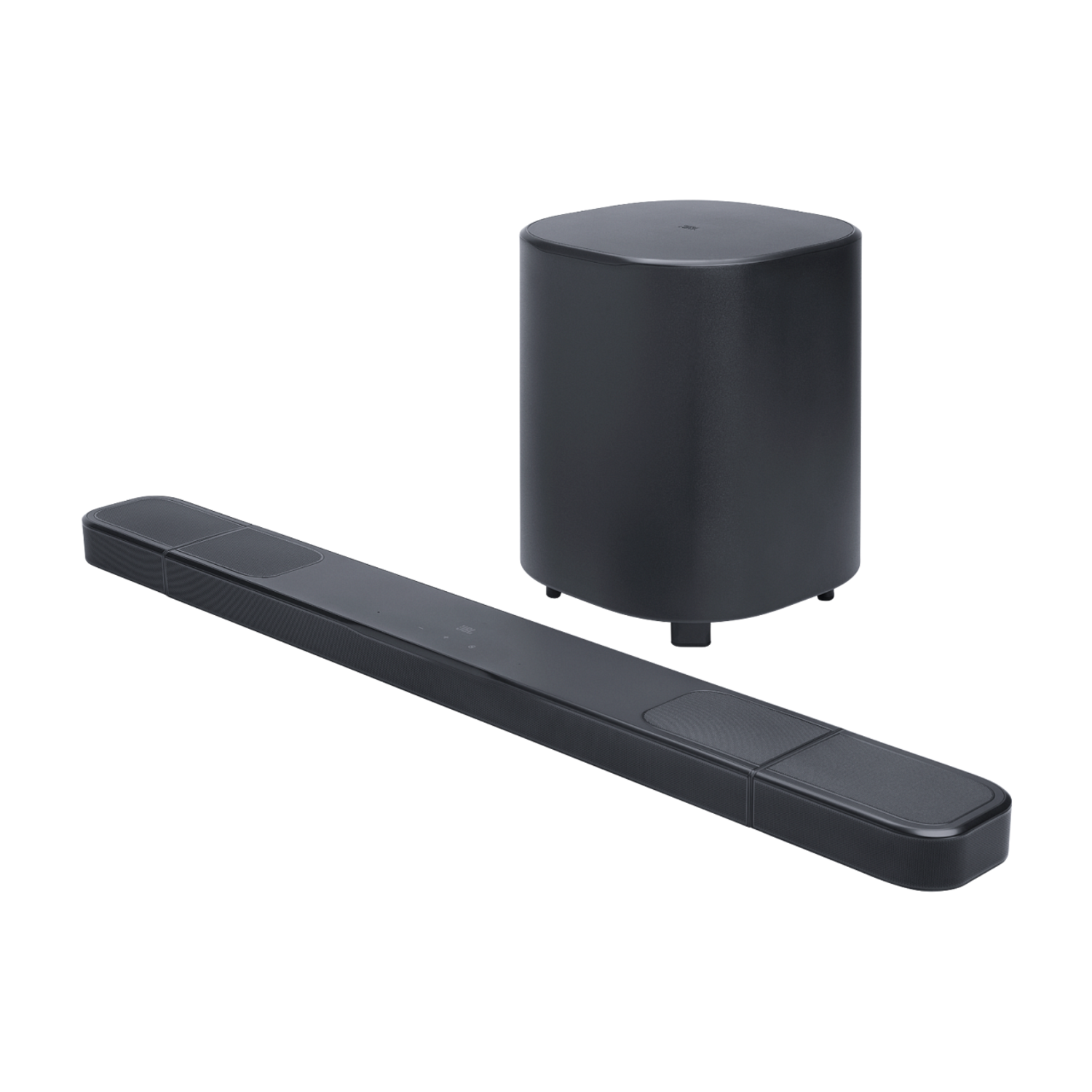Barre de son JBL, caisson de basses et télécommande. L'ensemble est noir sur fond noir.